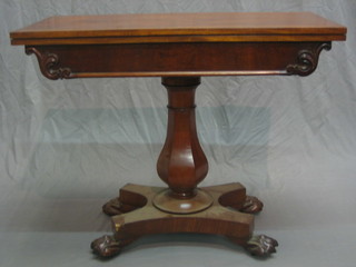 A  William IV rectangular mahogany tea table, raised on baluster support with triform base 36"