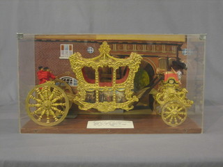 A wooden painted model of Louis XIV State Coach 22" complete with carrying case