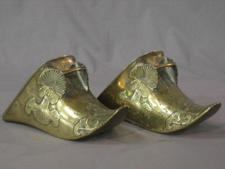 A pair of 18th/19th Century Eastern polished brass stirrup boots