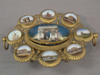 An oval French gilt painted metal trinket box, the lid and side mounts decorated views of Paris 11"