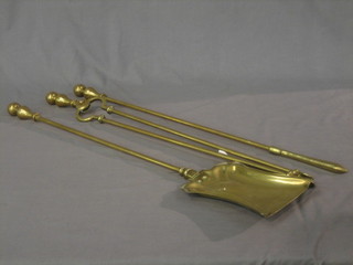 A 19th Century brass 3 piece fireside companion set comprising tongs, spade and poker