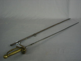 An 18th Century style sword with 30" straight blade and brass hilt, together with an associated metal sabre scabbard