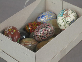 A collection of various marble eggs