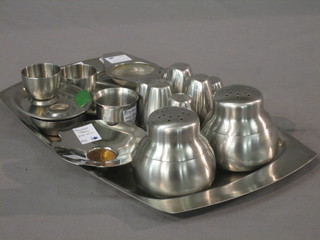 A Oldhall oval tray, 2 large pepper pots, 2 egg cups, 4 salt and pepper pots
