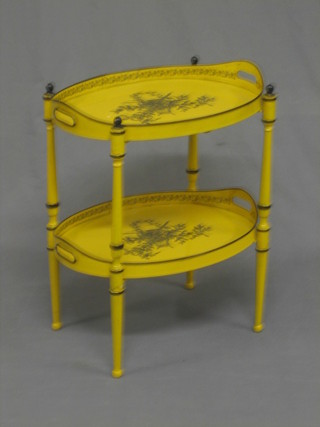 A yellow metal bamboo effect 2 tier trolley with 2 oval trays 19"