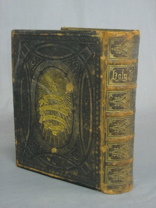 A Browns self interpretating Family Holy Bible, leather bound