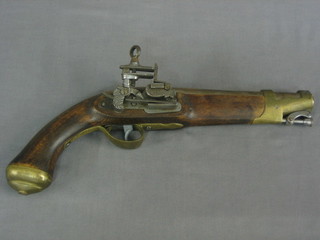 A reproduction Continental flintlock pistol with stirrup ram rod and 8" barrel