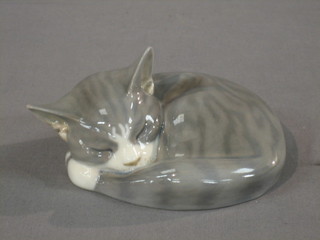 A Royal Copenhagen figure of a curled cat, base marked 1025 422 6"