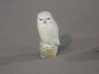 A Royal Copenhagen figure of a seated owl, base marked 7141 3"