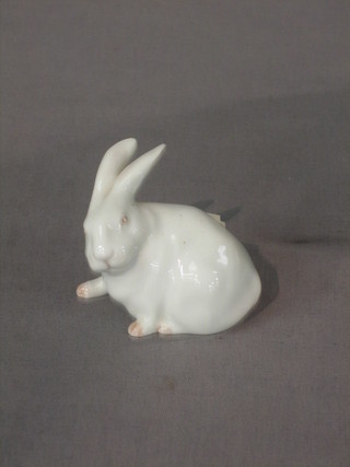 A Royal Copenhagen figure of a seated white hare, base marked 111 2"