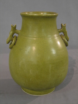 An Oriental Celadon twin handled vase, the base with 4 character mark 9"