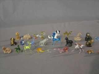 A collection of various Wade Whimsies, glass animals etc