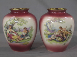 A pair of red glazed oval pottery vases decorated romantic scenes 8"