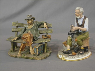 A Capo di Monte figure of a seated tramp (fingers chipped) 7" and 1 other in the form of a Cobbler 9"