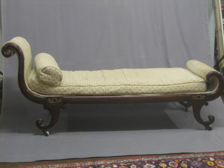 A William IV mahogany show frame day bed, raised on scroll supports 76"