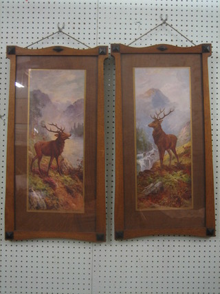 A pair of coloured prints "Stags" contained in oak frames 19" x 7 1/2"