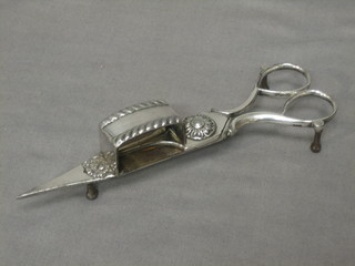 A pair of 19th Century silver plated candle snuffers