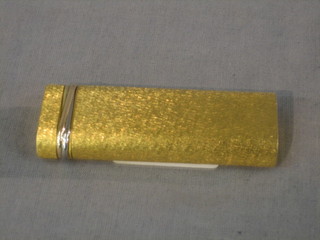 A Cartier gold plated lighter