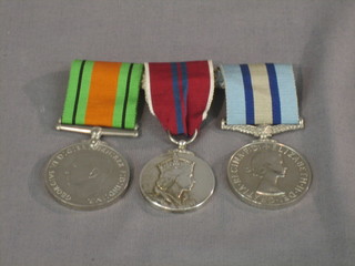 A Family group - husband and wife,  Observer N A Gill, comprising Defence medal, 1953 Coronation medal and Observer Corps medal together with Observer Corps medal to Chief Observer D F Gill