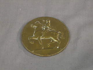 A Continental bronze medallion dated 1910