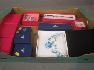11 boxed items of costume jewellery