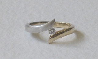 A lady's 18ct 2 colour gold dress ring set a diamond