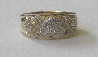 A lady's 18ct heavy gold cluster dress ring set numerous diamonds, approx 0.25ct
