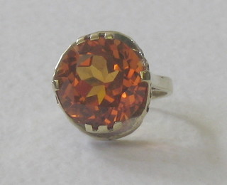 A 14ct yellow gold dress ring set a "fire opal"
