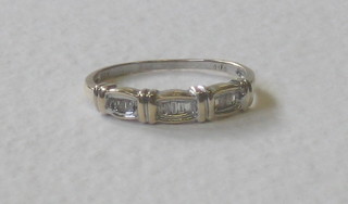 A lady's 18ct gold half eternity/dress ring set baguette cut diamonds