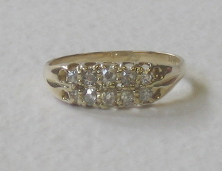 A lady's 18ct gold dress ring set 2 rows of diamonds, approx 0.50ct