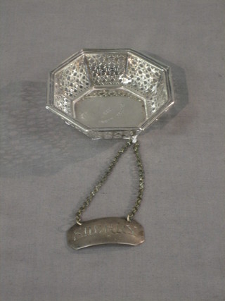 A George III silver sherry decanter label, London 1785 and an octagonal silver dish (f)