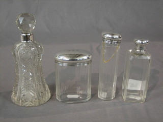 A square dressing table jar with silver collar, ditto pin jar (f), oval glass dressing table jar with silver lid and a scent bottle (f)