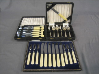 A set of 6 silver plated fruit knives and forks by Harrods, boxed, a set of 6 silver plated grapefruit spoons boxed and a set of 6 tea knives, boxed