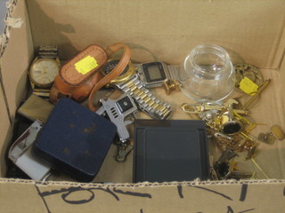 A Mycro miniature camera, a collection of various lighters, 3 wristwatches, badges, cufflinks etc