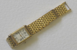 A lady's wristwatch by Michel Herblin contained in a "gold" case