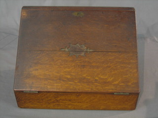 A 19th Century mahogany stationery box with fitted interior and with writing slope to the front 15"