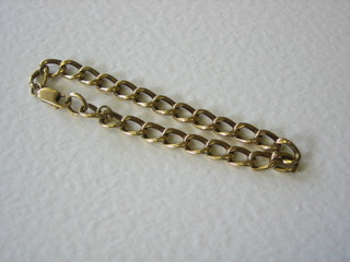 A modern 9ct gold curb link bracelet