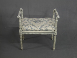 A turquoise painted window seat with cane seat, raised on turned and fluted supports 26"