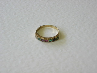 A 9ct gold ring set semi-precious stones