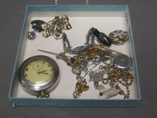 An open faced pocket watch contained in a metal case, a silver brooch and a small collection of costume jewellery