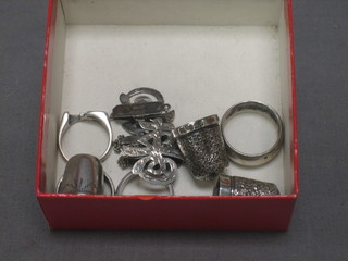 4 various silver rings, 3 silver thimbles etc