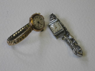 A lady's gold cased wristwatch and 1 other