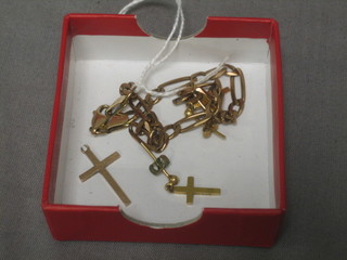 A  modern 9ct gold flat link chain, a gold cross and a pair of gold cross earrings