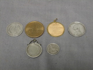 A Victorian 1887 shilling together with an 1889 do. and a small collection of coins together with a 9ct gold pendant