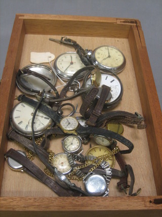 A collection of various pocket watches and a collection of wristwatches