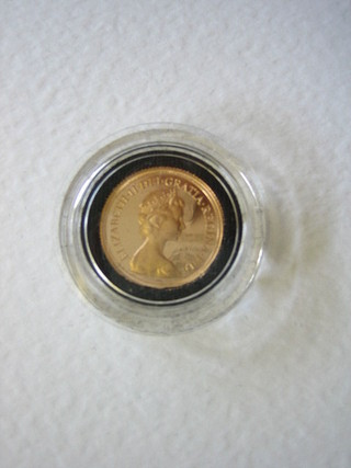 A 1979 gold proof sovereign, cased