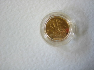 A 1982 gold proof sovereign, cased