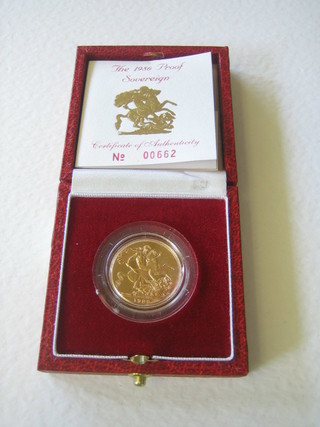 A 1986 gold proof sovereign, cased