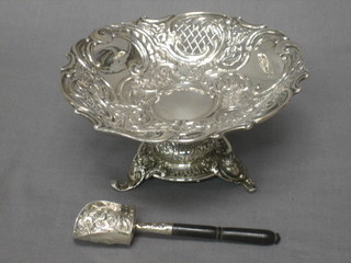 An embossed silver pedestal bowl and an embossed silver caddy spoon, 5 ozs