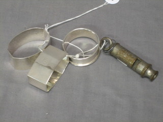 3 silver napkin rings and an ARP whistle